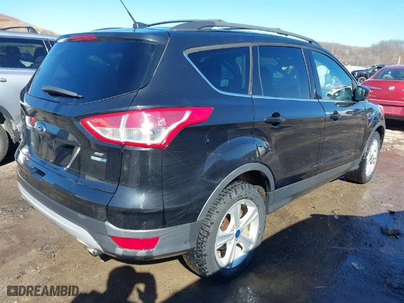 2013 Ford Escape SE with VIN 1FMCU9GX4DUD30453, listed as a IAAI auction lot 41589446 with 130,556 mi miles. Bid and sale history available at carsss.com. Image 4.