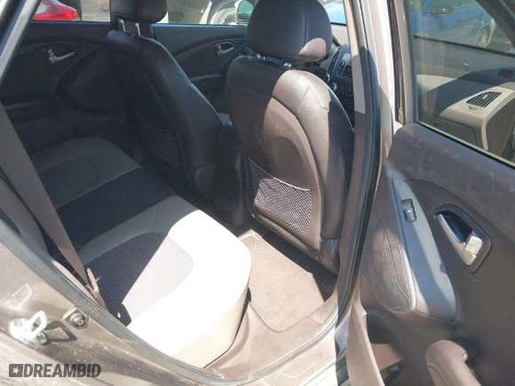 2013 Hyundai Tucson GLS with VIN KM8JU3AC0DU557505, listed as a IAAI auction lot 42017594 with 159,551 mi miles. Bid and sale history available at carsss.com. Image 8.