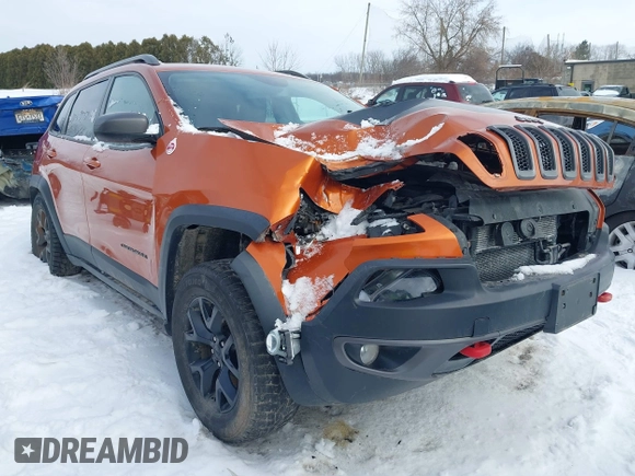2015 Jeep Cherokee Trailhawk with VIN 1C4PJMBS9FW655233, listed as a IAAI auction lot 41430715 with 138,181 mi miles and . Bid and sale history available at carsss.com. Image 6.