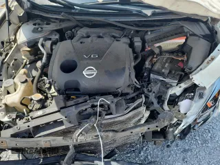 2014 Nissan Maxima S z VIN 1N4AA5AP9EC908047, wystawiony jako Copart lot #58530495 z przebiegiem 134 152 mil mil oraz Szkoda całkowita • Salvage title. Historia ofert i sprzedaży dostępna na DreamBid. Obrazek 11.