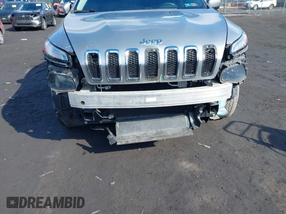 2014 Jeep Cherokee Altitude with VIN 1C4PJMCB5EW167961, listed as a IAAI auction lot 41660440 with 88,705 mi miles and . Bid and sale history available at DreamBid. Image 6.