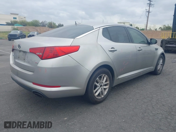 2013 Kia Optima LX with VIN KNAGM4A71D5414691, listed as a IAAI auction lot 41916576 with 245,851 mi miles. Bid and sale history available at carsss.com. Image 4.