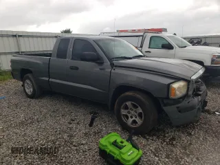 2005 Dodge Dakota SLT with VIN 1D7HE42N65S160583, listed as a Copart auction lot 61182565 with 277,936 mi miles and Salvage title. Bid and sale history available at DreamBid. Image 4.
