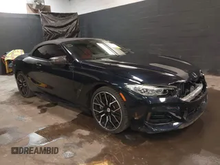 2023 BMW 8 Series with VIN WBAFY4C01PCM52812, listed as a IAAI auction lot 41967777 with 12,490 mi miles and . Bid and sale history available at DreamBid. Image 1.