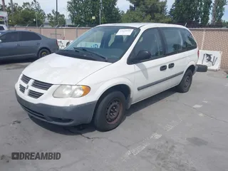 2005 Dodge Caravan SE with VIN 1D4GP25B45B287289, listed as a IAAI auction lot 42658990 with 217,918 mi miles and . Bid and sale history available at DreamBid. Image 2.