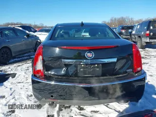2013 Cadillac CTS Premium z VIN 1G6DS5E34D0160676, wystawiony jako IAAI lot #41262795 z przebiegiem 122 248 mil mil oraz . Historia ofert i sprzedaży dostępna na DreamBid. Obrazek 16.