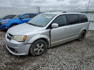 2011 Dodge Grand Caravan Crew with VIN 2D4RN5DG6BR693469, listed as a Copart auction lot 50952085 with 209,501 mi miles and Clean Title. Bid and sale history available at DreamBid. Image 1.