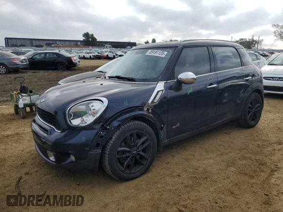 2011 MINI Countryman S with VIN WMWZC5C53BWH99985, listed as a Copart auction lot 89191125 with 90,177 mi miles and Salvage Title. Bid and sale history available at DreamBid. Image 1.