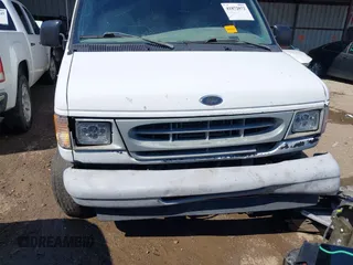 2001 Ford Econoline Cargo with VIN 1FTNE24L11HA65062, listed as a IAAI auction lot 41872072 with 456,684 mi miles and . Bid and sale history available at DreamBid. Image 12.