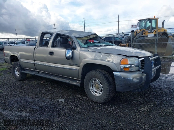 2000 GMC Sierra 2500 SLE z VIN 1GTGK29U7YE380284, wystawiony jako IAAI lot #41965443 z przebiegiem 189 831 mil mil oraz . Historia ofert i sprzedaży dostępna na DreamBid. Obrazek 1.
