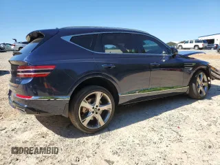 2023 Genesis GV80 with VIN KMUHCESC7PU121865, listed as a Copart auction lot 57990365 with Not provided miles and Salvage title. Bid and sale history available at DreamBid. Image 3.