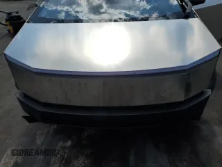 2024 Tesla Cybertruck с VIN 7G2CEHED3RA051591, выставлен на аукционе Copart как лот 56845395 с пробегом Не указан миль и На запчасти • Non repairable. История ставок и продаж доступна на DreamBid. Изображение 11.