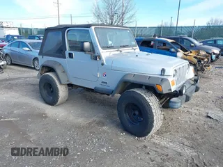 2003 Jeep Wrangler X with VIN 1J4FA39S33P363153, listed as a IAAI auction lot 41584805 with 160,676 mi miles. Bid and sale history available at carsss.com. Image 1.