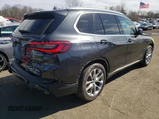 2021 BMW X5 xDrive45e with VIN 5UXTA6C01M9H62393, listed as a Copart auction lot 47083315 with 66,910 mi miles and Salvage title. Bid and sale history available at DreamBid. Image 3.