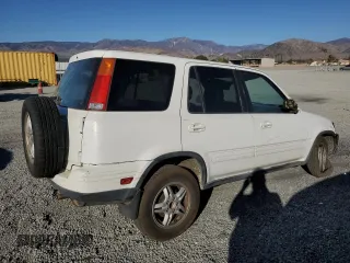 2000 Honda CR-V SE z VIN JHLRD1876YS019786, wystawiony jako Copart lot #88793865 z przebiegiem 168 507 mil mil oraz Szkoda całkowita • Salvage title. Historia ofert i sprzedaży dostępna na DreamBid. Obrazek 3.