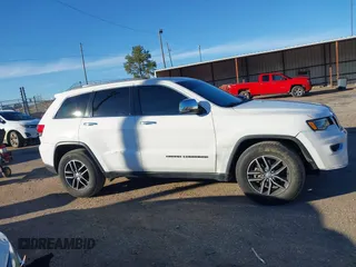 2017 Jeep Grand Cherokee Limited with VIN 1C4RJEBG8HC887899, listed as a IAAI auction lot 41242803 with 96,574 mi miles and . Bid and sale history available at DreamBid. Image 13.