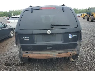 2011 Mercury Mariner Premier z VIN 4M2CN9HG1BKJ00209, wystawiony jako Copart lot #57016475 z przebiegiem 224 019 mil mil oraz Szkoda całkowita • Salvage title. Historia ofert i sprzedaży dostępna na DreamBid. Obrazek 6.