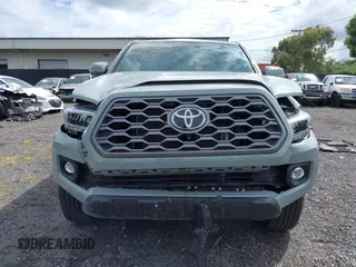 2023 Toyota Tacoma SR5 z VIN 3TYDZ5BNXPT024914, wystawiony jako IAAI lot #41302756 z przebiegiem 20 307 mil mil oraz . Historia ofert i sprzedaży dostępna na DreamBid. Obrazek 13.