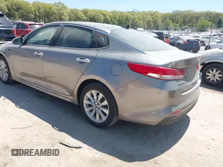 2017 Kia Optima EX with VIN 5XXGU4L38HG142560, listed as a IAAI auction lot 42167391 with 61,015 mi miles and . Bid and sale history available at DreamBid. Image 3.