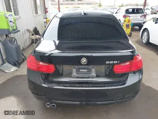 2015 BMW 3 Series 328i with VIN WBA3A5G53FNS89800, listed as a IAAI auction lot 41627009 with 122,413 mi miles. Bid and sale history available at carsss.com. Image 16.