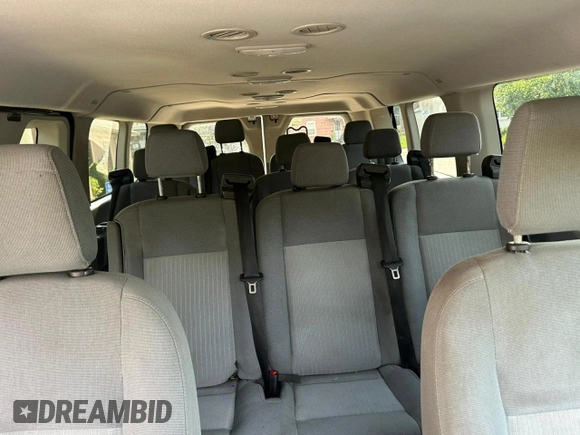 2018 Ford Transit Passenger XL z VIN 1FBZX2ZM4JKA99811, wystawiony jako Copart lot #64906155 z przebiegiem 172 355 mil mil oraz Czysty tytuł • Clean title. Historia ofert i sprzedaży dostępna na DreamBid. Obrazek 9.