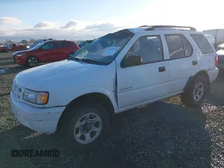 2001 Isuzu Rodeo S with VIN 4S2DM58W014335513, listed as a IAAI auction lot 41529329 with 173,891 mi miles and . Bid and sale history available at DreamBid. Image 18.
