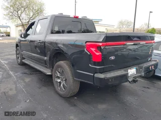 2023 Ford F-150 Lightning Pro with VIN 1FTVW1EL0PWG29715, listed as a IAAI auction lot 42023439 with 10,637 mi miles. Bid and sale history available at carsss.com. Image 3.