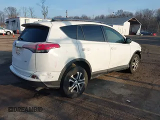 2017 Toyota RAV4 LE with VIN JTMZFREV7HJ120317, listed as a IAAI auction lot 41166489 with 144,799 mi miles and . Bid and sale history available at carsss.com. Image 4.