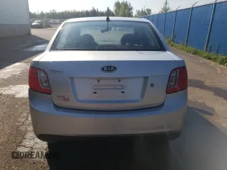 2011 Kia Rio with VIN KNADH4B32B6915275, listed as a Copart auction lot 71546484 with 297,998 mi miles and Salvage Title. Bid and sale history available at DreamBid. Image 6.