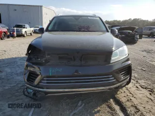 2016 Volkswagen Touareg Sport with VIN WVGEF9BP7GD010767, listed as a Copart auction lot 44782585 with 125,970 mi miles and Salvage Title. Bid and sale history available at DreamBid. Image 5.