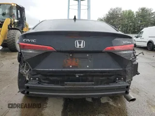 2023 Honda Civic Sport with VIN 2HGFE2F52PH548082, listed as a Copart auction lot 57226055 with 33,155 mi miles and Salvage title. Bid and sale history available at DreamBid. Image 6.