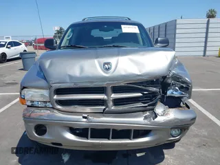 2001 Dodge Durango z VIN 1B4HS28ZX1F520696, wystawiony jako IAAI lot #42505170 z przebiegiem 72 299 mil mil oraz . Historia ofert i sprzedaży dostępna na DreamBid. Obrazek 12.