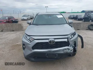 2020 Toyota RAV4 XLE with VIN 2T3W1RFV4LW094687, listed as a IAAI auction lot 42652039 with 56,693 mi miles and . Bid and sale history available at DreamBid. Image 12.