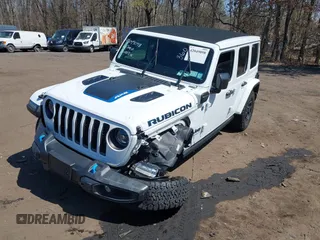 2023 Jeep Wrangler Rubicon with VIN 1C4JJXR68PW584303, listed as a IAAI auction lot 42049098 with 29,565 mi miles and . Bid and sale history available at DreamBid. Image 6.