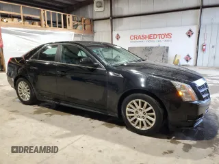 2010 Cadillac CTS with VIN 1G6DA5EG6A0143282, listed as a Copart auction lot 43813795 with 109,657 mi miles and Salvage Title. Bid and sale history available at DreamBid. Image 4.
