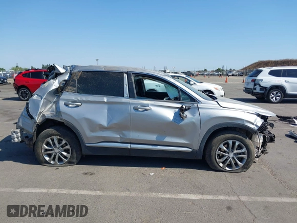 2020 Hyundai Santa Fe SE z VIN 5NMS2CAD1LH221326, wystawiony jako IAAI lot #42442177 z przebiegiem 68 995 mil mil oraz . Historia ofert i sprzedaży dostępna na DreamBid. Obrazek 14.