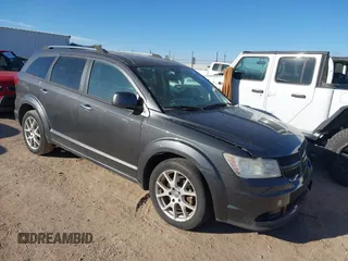 2014 Dodge Journey Limited with VIN 3C4PDDDG2ET175023, listed as a IAAI auction lot 41646669 with 112,663 mi miles and . Bid and sale history available at carsss.com. Image 1.