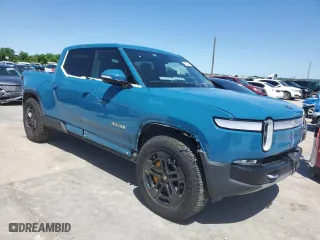 2022 Rivian R1T Adventure Package with VIN 7FCTGAAA4NN016700, listed as a Copart auction lot 49730914 with 33,339 mi miles and Clean Title. Bid and sale history available at carsss.com. Image 4.