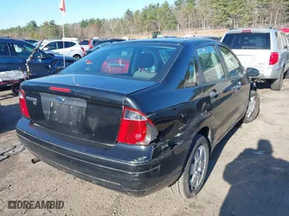 2007 Ford Focus S with VIN 1FAHP34N07W166828, listed as a IAAI auction lot 41992308 with 143,169 mi miles. Bid and sale history available at carsss.com. Image 4.