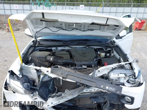 2017 Toyota Tacoma SR5 z VIN 3TMAZ5CN8HM045727, wystawiony jako IAAI lot #41962213 z przebiegiem 88 042 mil mil oraz . Historia ofert i sprzedaży dostępna na DreamBid. Obrazek 10.