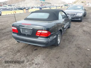 1999 Mercedes-Benz CLK with VIN WDBLK65G1XT013704, listed as a IAAI auction lot 42115880 with 85,741 mi miles. Bid and sale history available at carsss.com. Image 4.