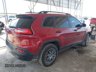 2017 Jeep Cherokee Altitude with VIN 1C4PJLAB4HW640458, listed as a IAAI auction lot 42348793 with 123,062 mi miles and . Bid and sale history available at DreamBid. Image 4.