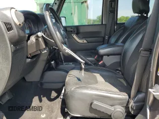 2016 Jeep Wrangler Unlimited Sahara with VIN 1C4BJWEG6GL212733, listed as a Copart auction lot 62664445 with 114,004 mi miles and Salvage title. Bid and sale history available at DreamBid. Image 7.