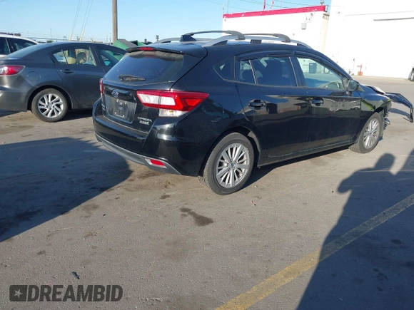 2017 Subaru Impreza Premium with VIN 4S3GTAB63H3721131, listed as a IAAI auction lot 42343352 with 116,939 mi miles and . Bid and sale history available at DreamBid. Image 4.