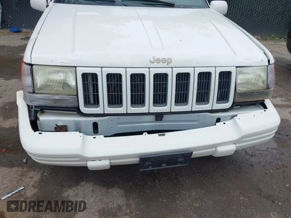 1997 Jeep Grand Cherokee Limited z VIN 1J4GZ78S1VC536295, wystawiony jako IAAI lot #42435292 z przebiegiem 310 005 mil mil oraz . Historia ofert i sprzedaży dostępna na DreamBid. Obrazek 6.
