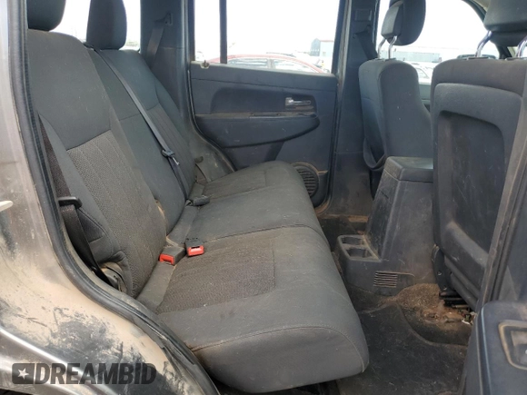2012 Jeep Liberty Sport Latitude z VIN 1C4PJMAKXCW161928, wystawiony jako Copart lot #49835595 z przebiegiem 149 056 mil mil oraz Czysty tytuł • Clean title. Historia ofert i sprzedaży dostępna na DreamBid. Obrazek 10.