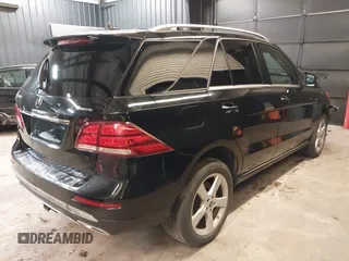 2019 Mercedes-Benz GLE 400 with VIN 4JGDA5GBXKB216718, listed as a IAAI auction lot 42531879 with 95,734 mi miles and . Bid and sale history available at DreamBid. Image 4.