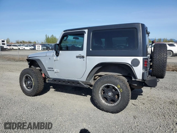 2012 Jeep Wrangler Sport z VIN 1C4AJWAG3CL151885, wystawiony jako Copart lot #51682175 z przebiegiem 111 544 mil mil oraz Szkoda całkowita • Salvage title. Historia ofert i sprzedaży dostępna na DreamBid. Obrazek 2.