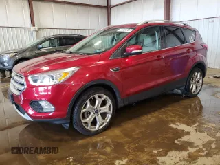 2019 Ford Escape Titanium with VIN 1FMCU9J98KUB93072, listed as a Copart auction lot 61931205 with 64,412 mi miles and Salvage title. Bid and sale history available at DreamBid. Image 1.
