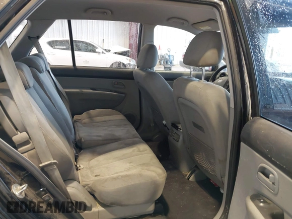 2009 Kia Rondo LX with VIN KNAFG528297278647, listed as a IAAI auction lot 42139810 with 161,314 mi miles. Bid and sale history available at carsss.com. Image 8.